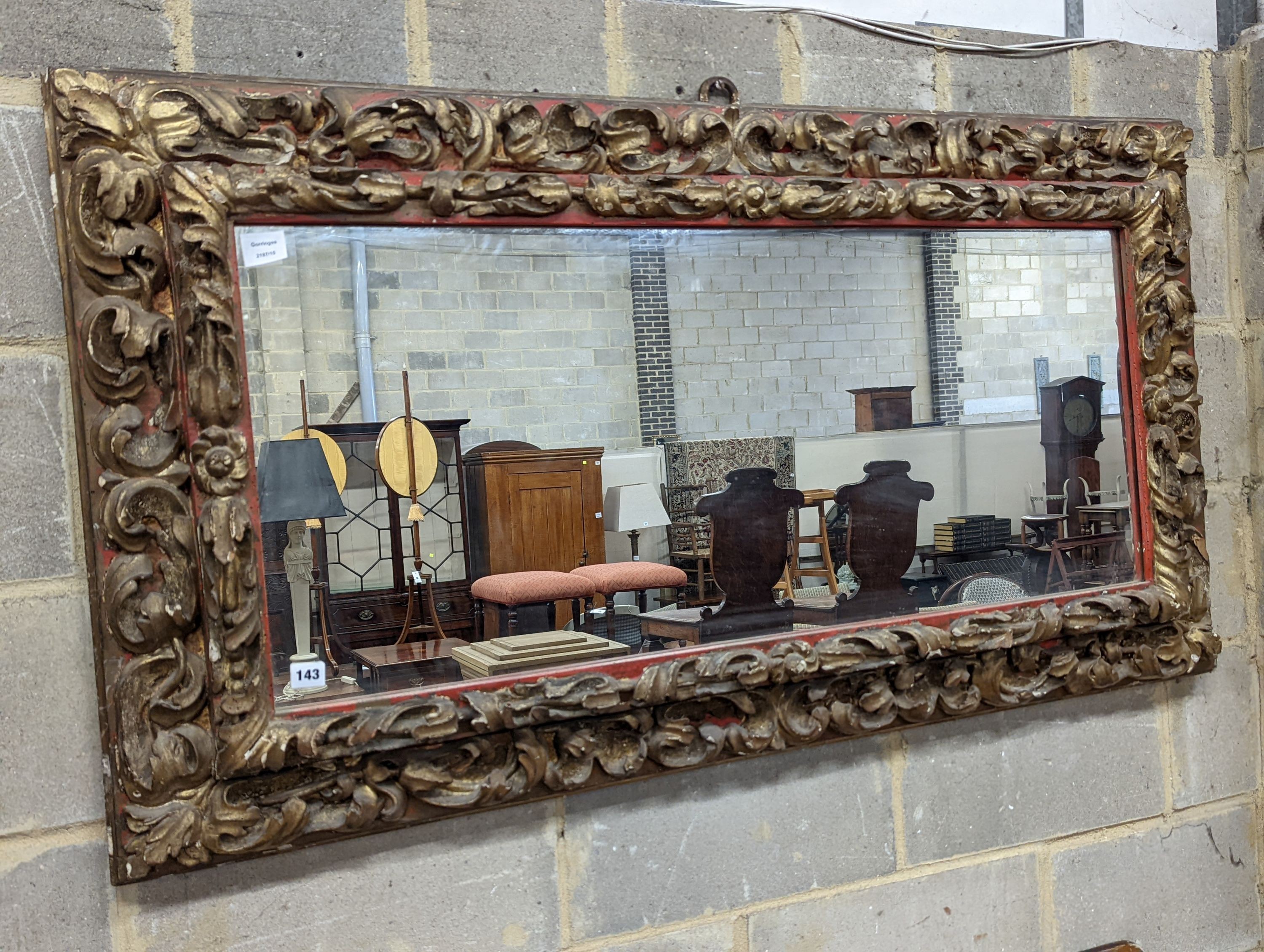 A 19th century carved giltwood rectangular wall mirror, width 140cm, height 76cm